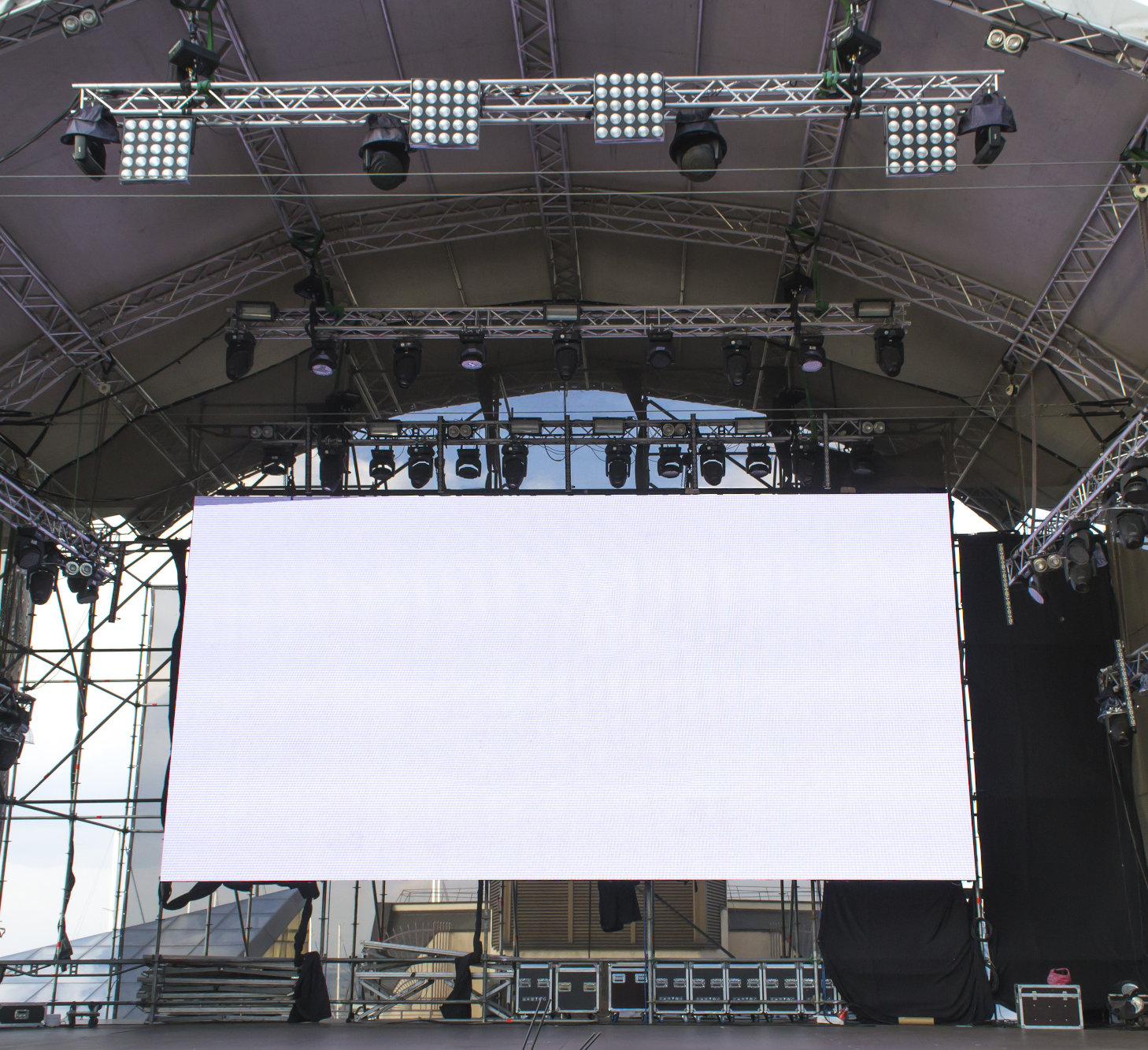 White poster in the middle of the concert stage.